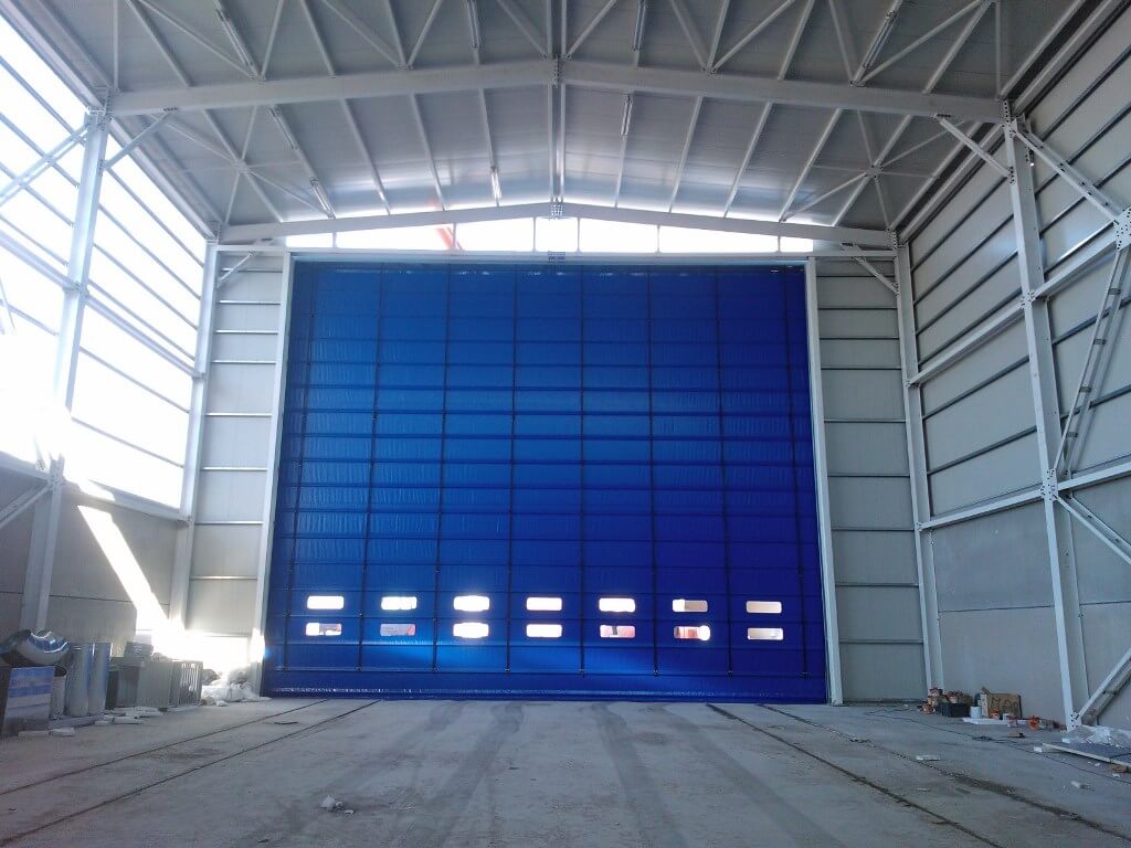Portoni grandi dimensioni a chiusura rapida e impacchettamento ... Porte a libro garage dimensioni