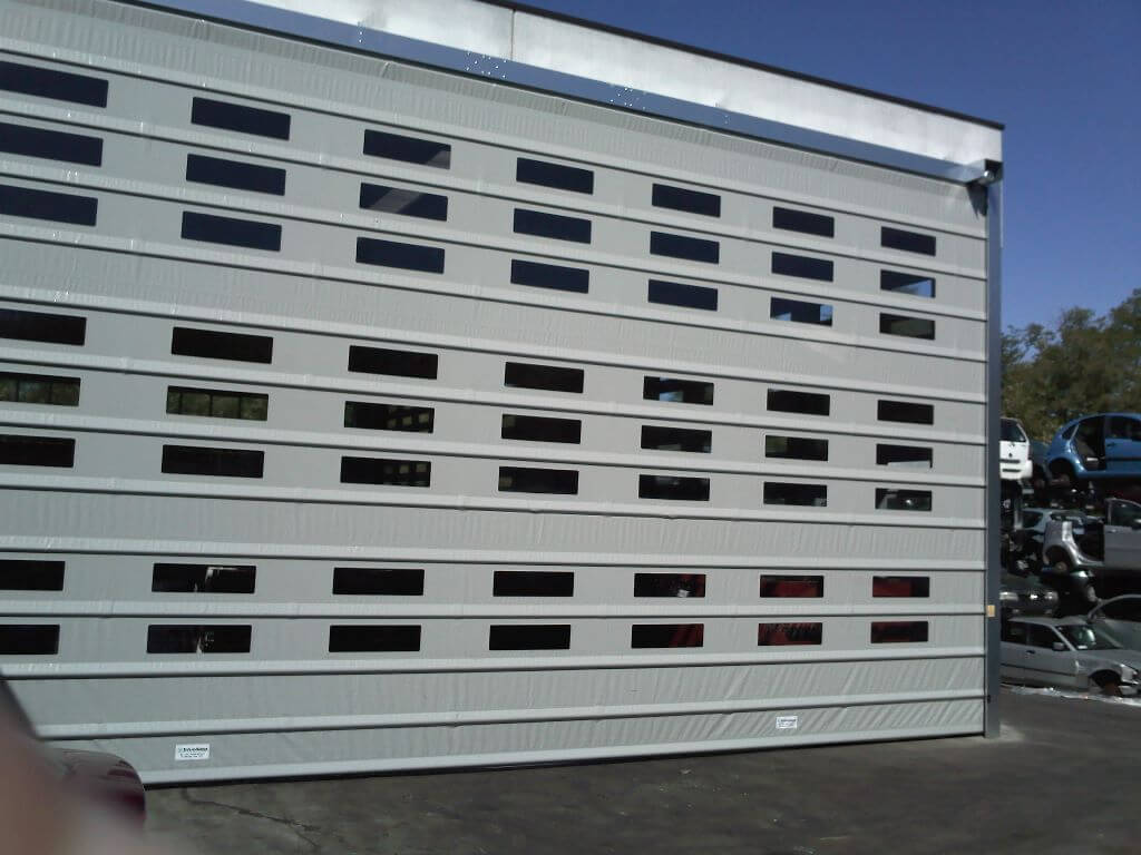 Portoni grandi dimensioni a chiusura rapida e impacchettamento ... Porte a libro garage dimensioni