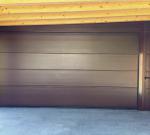 Sectional door pedestrian door